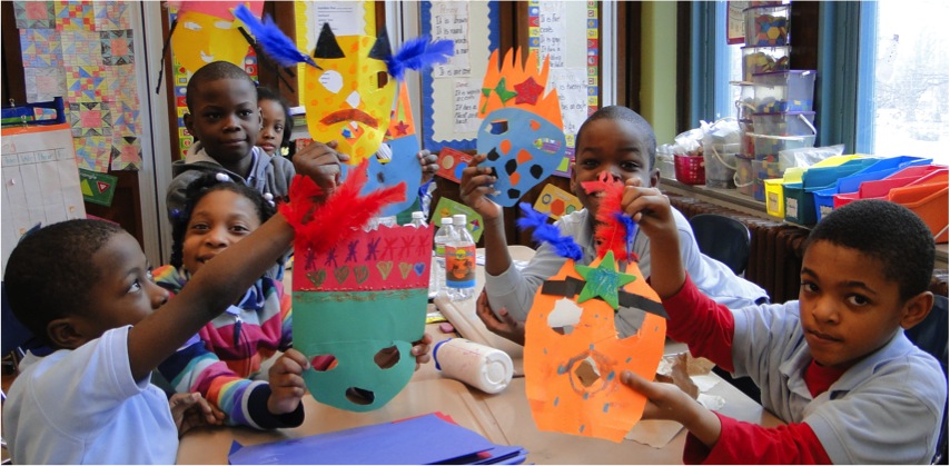 Kids showing Haitian Masks