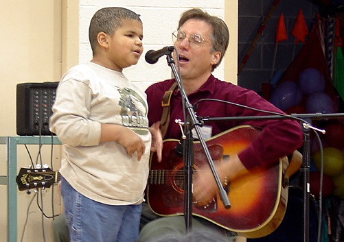 Tim with boy singing