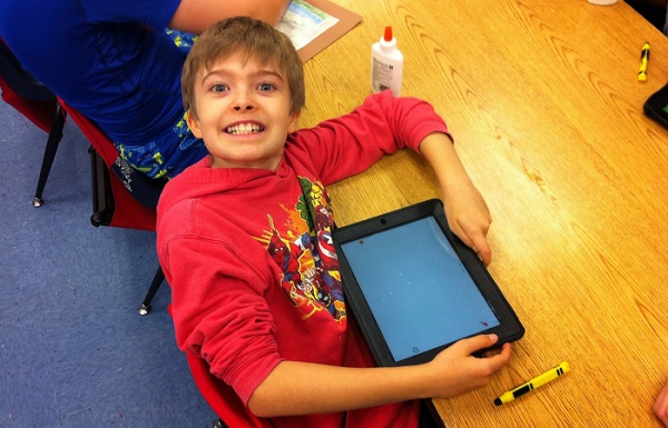 Student with iPad