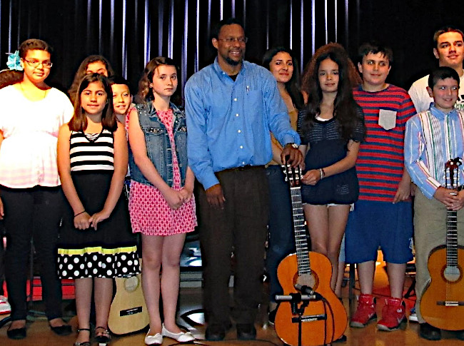 Leo Colon onstage with students